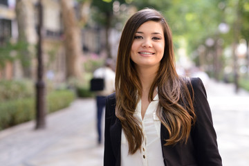 Japanese business woman in urban background