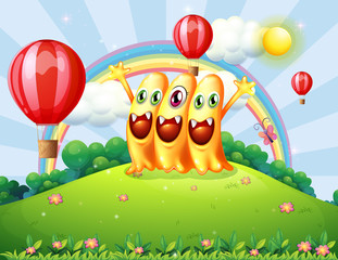 Sticker - A hilltop with three happy monsters watching the floating balloo