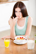 © Karramba Production - Portrait of the girl eating healthy muesli