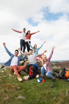 group of young people hiking in countryside