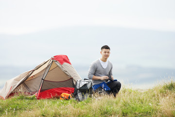 Wall Mural - Young Man On Camping Trip In Countryside