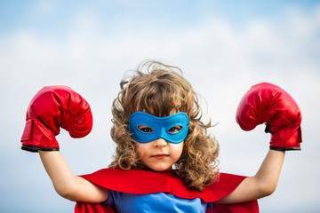 Wall Mural - Superhero kid. Girl power concept