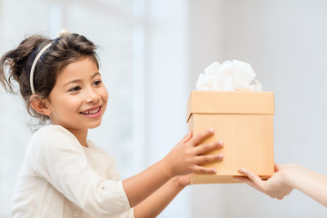 Sticker - happy child girl with gift box