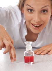 Wall Mural - woman doctor or nurse with medication in bottle