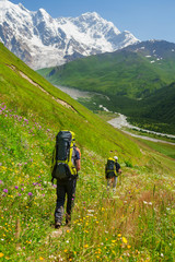 Wall Mural - Hiker take a rest during hiking in Caucasus mountains, Georgia