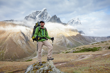 Wall Mural - hiker posing at camera on the trek in himalayas, nepal