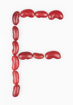 letter F made of red bean  on white background
