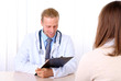 © Africa Studio - Doctor and patient at office