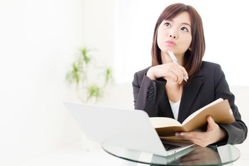 Wall Mural - young asian businesswoman working