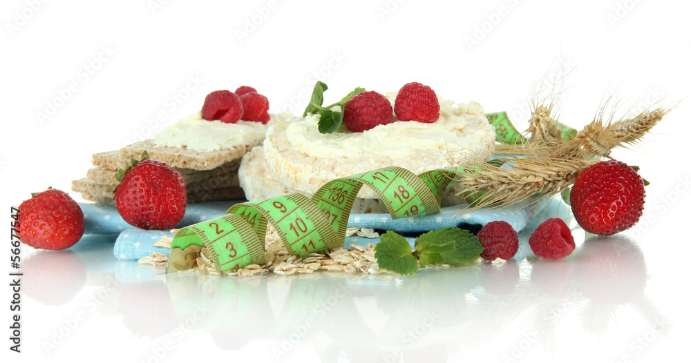 Tasty crispbread with berries, isolated on white