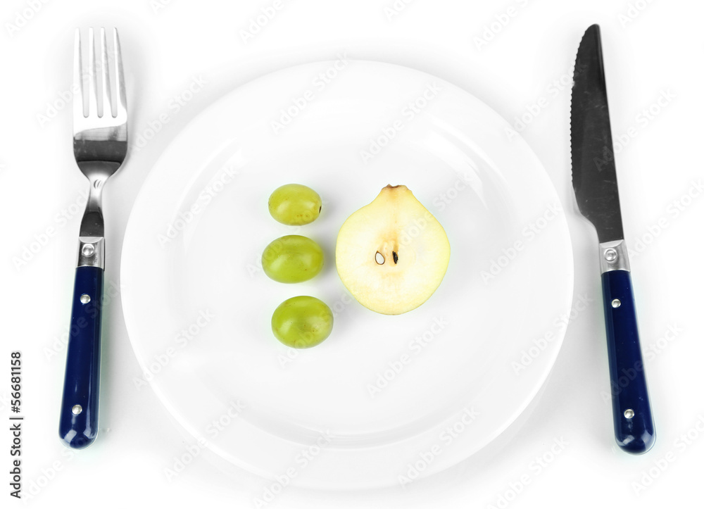 Small portion of food on big plate isolated on white