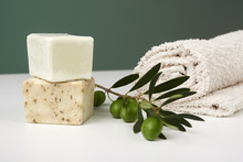 Handmade Olive Soap With Olive Branch And A Towel.