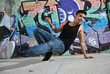 breakdance dancer on a city street