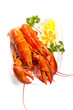 Lobster on dish with parsley and lemon slices