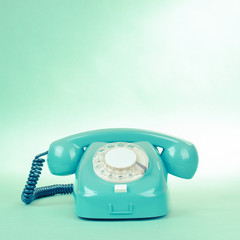 Fototapete - Retro mint green telephone photo with empty place for text