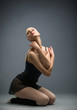 © Karramba Production - Dancing on the floor ballerina with her eyes closed