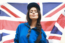 Beautiful Young Brunette Woman With British Flag