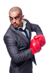 Wall Mural - Badly beaten businessman with boxing gloves