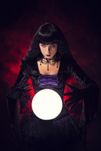 Beautiful Witch Or Fortune Teller With A Crystal Ball