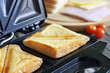 Sandwich toaster with toast closeup