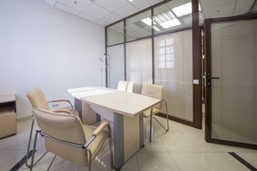 Wall Mural - Meeting room blinds closed with a table and  chairs