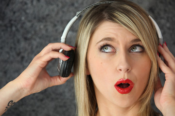 Blond woman with headphones