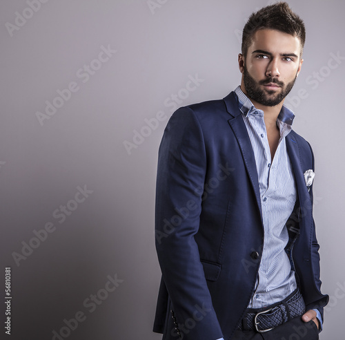 Fototapeta na wymiar Elegant young handsome man. Studio fashion portrait.