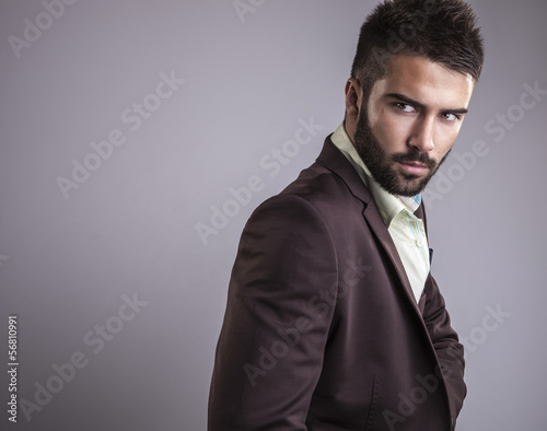 Foto-Doppelrollo - Elegant young handsome man. Studio fashion portrait. (von Unique Vision)