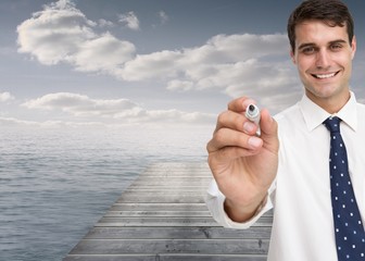 Poster - Happy businessman holding a marker