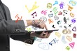 © alphaspirit - Businessman working with tablet and social media