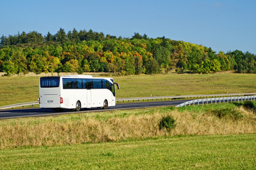 Wall Mural - white bus on the road in the countryside