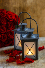 Canvas Print - Beautiful iron lanterns on wooden table. Romantic mood, stunning