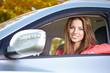 © ZoomTeam - Beautiful young sexy woman in car looking from window on autumn