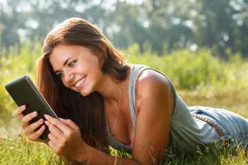 teenage girl using tablet pc