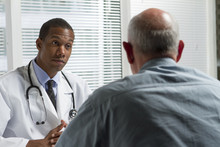 African American Doctor With Older Patient, Horizontal