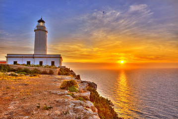 Wall Mural - La Mola Cape Lighthouse Formentera at sunrise