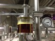 transparent screen to check beer quality at the brewery