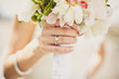 Bride's hands with flowers
