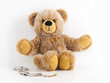 Teddybär mit Handschellen