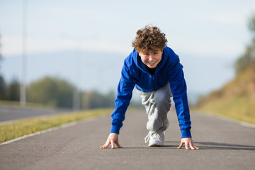 Wall Mural - Boy ready to run