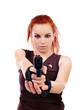 © Xalanx - Woman holding a gun and aiming