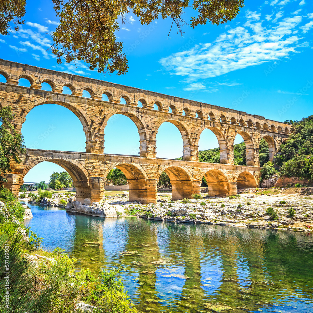 Roman aqueduct Pont du Gard, Unesco site.Languedoc, France. - obrazy, fototapety, plakaty 