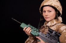 Female Soldier With SA80 Rifle