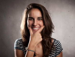 Wall Mural - happy young woman smiling