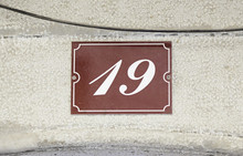 Metal Plate With The Number Nineteen