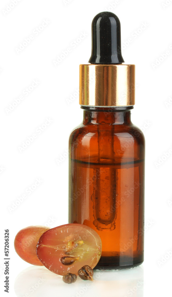 Ripe sliced grape and grapeseed oil, isolated on white