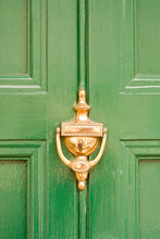 Green Door With Brass Knocker
