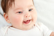 © Khorzhevska - cute funny infant smiling, beautiful kid's face closeup