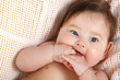 © Khorzhevska - cute funny infant smiling, beautiful kid's face closeup