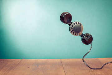 Fototapete - Retro telephone handset with rotary disk background concept